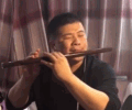 盲人大哥用笛子演奏《沧海一声笑》